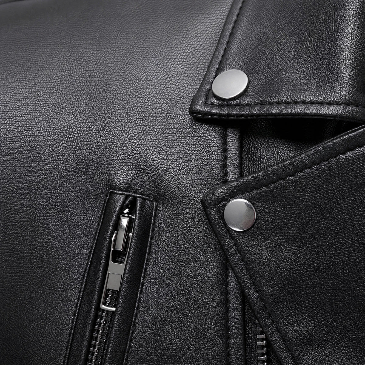 Veste de moto en cuir délavé vintage avec col montant - close-up détail matière