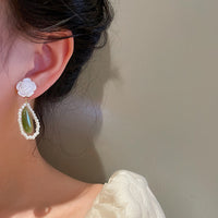 boucles-doreilles-oeil-de-chat-vert-vintage