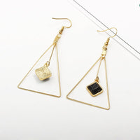 femme-triangle-des-annees-80-boucle-d-oreille