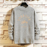 pull-vintage-imprime-lettre-homme