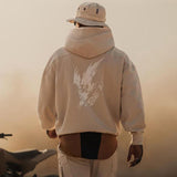 sweat-a-capuche-ample-imprime-dos-vintage
